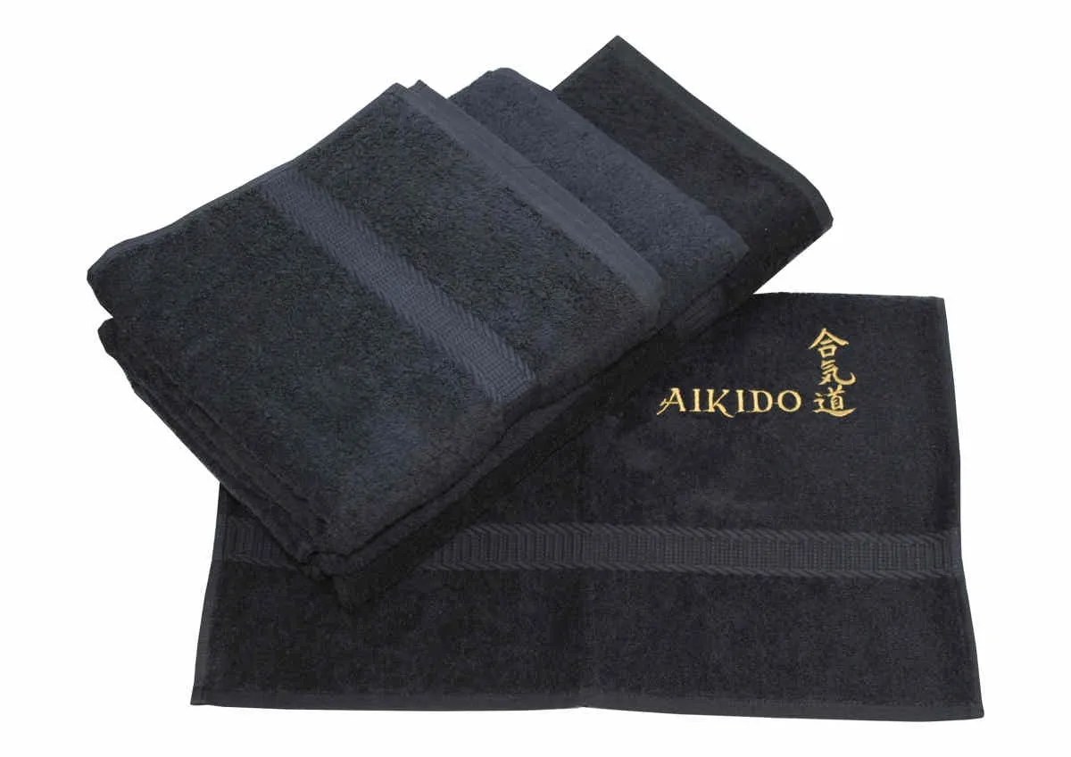 Frottehåndklæder i sort broderet i guld med Aikido og tegn