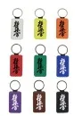 Nøglering i forskellige farver med Kyokushinkai-motiv